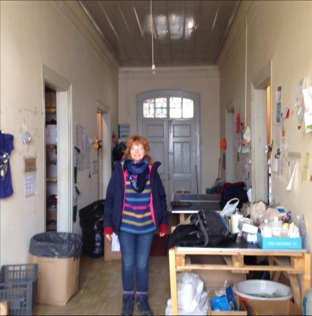My very first shift. Standing in the hall of the storage house. Each room filled with boxes of clothes. 